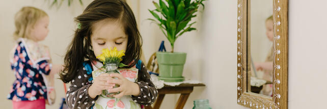 Child arranging flowers