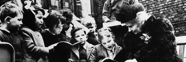 Maria Montessori, 1951, London, reading with children